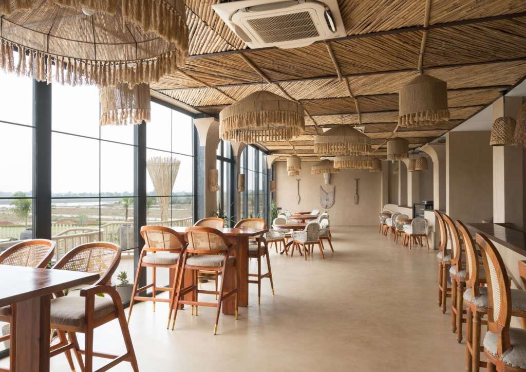 This Lakeside Retreat in Raipur Hides Its Structure and Lets Bamboo and Stillness Take Over