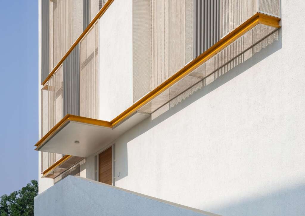 This cascading Rajkot home filters sunlight, protects privacy, and quietly defies its narrow plot