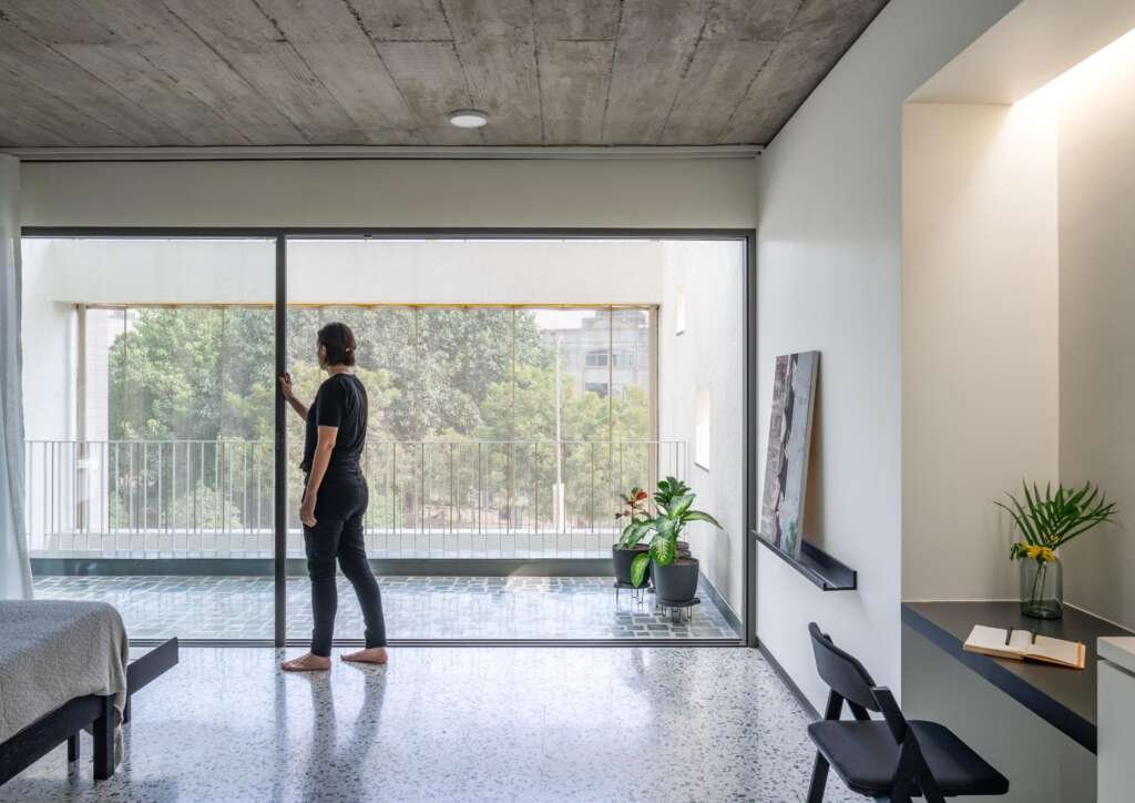 This cascading Rajkot home filters sunlight, protects privacy, and quietly defies its narrow plot