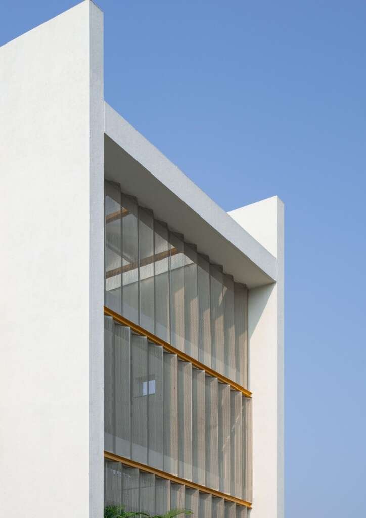 This cascading Rajkot home filters sunlight, protects privacy, and quietly defies its narrow plot