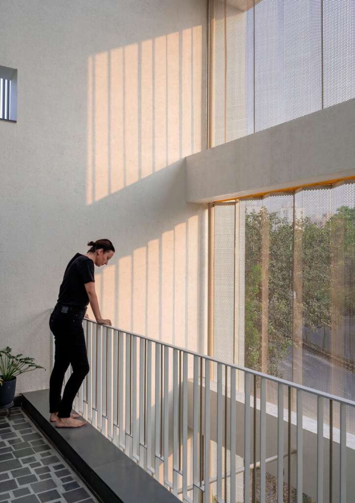 This cascading Rajkot home filters sunlight, protects privacy, and quietly defies its narrow plot