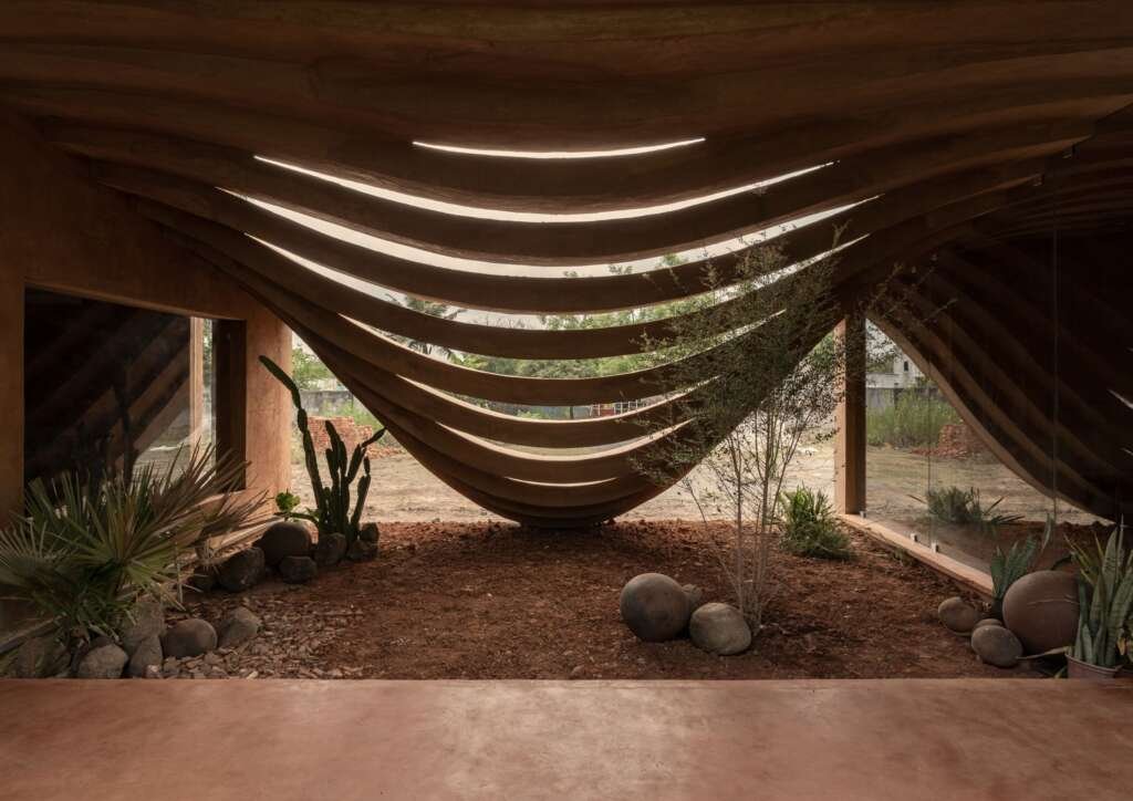 Vaazh: A Handcrafted Earth Home Embracing Nature