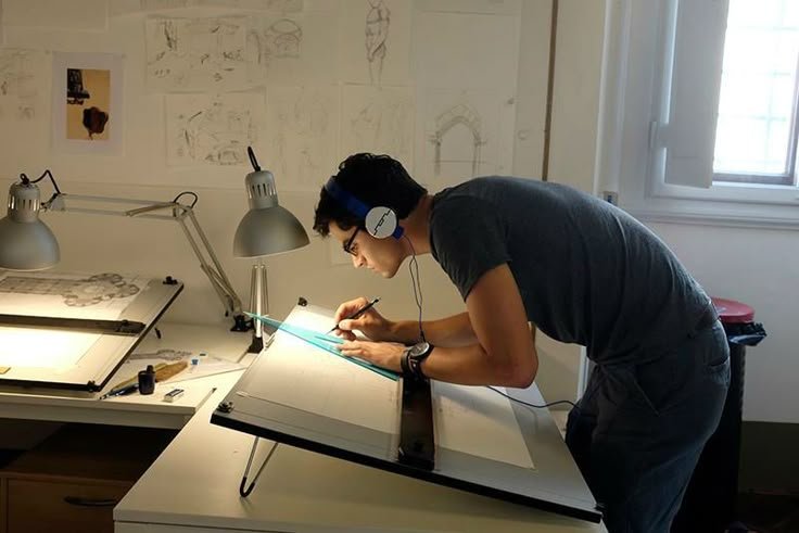 Undergraduate architecture students working in a design studio, showcasing the hands-on, collaborative environment typical of a B.Arch degree.