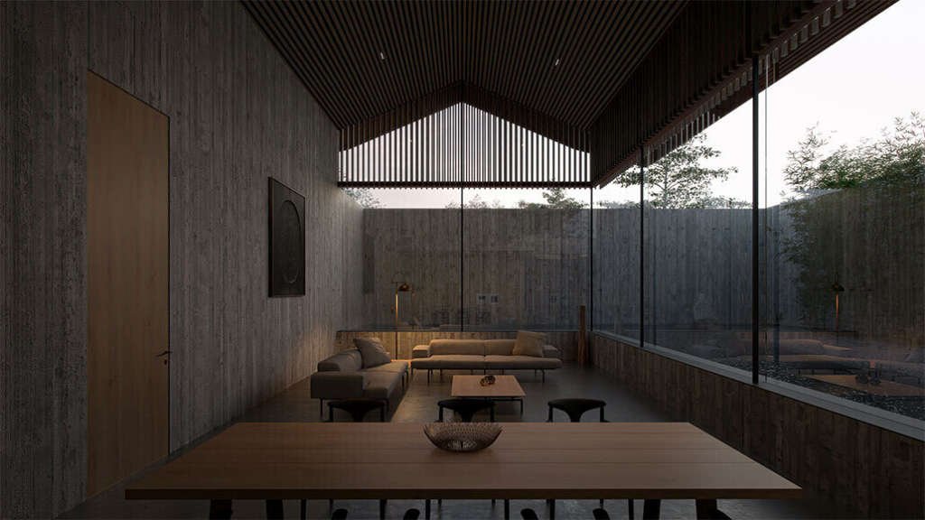 Gathering space enclosed in glass maintaining transparency with the exteriors creating an atmosphere to contemplation