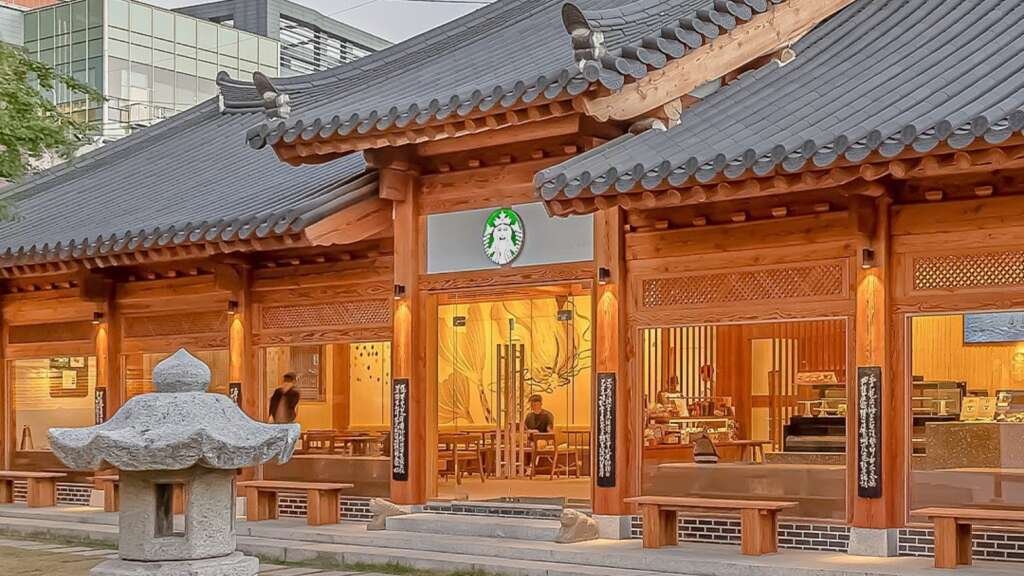 Starbucks Cheongdam Seoul with floor-to-ceiling glass and luxury minimalist interiors