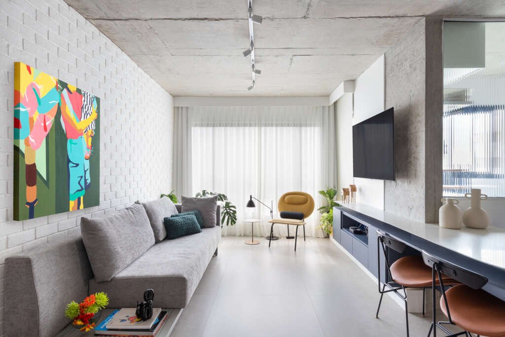 Contemporary living room with multiple functions like sitting room, study room, reading room