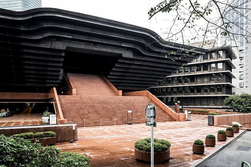 exterior view showing entrance stairs & inverted pyramid structure of Reiyukai Shakaden Temple, Tokyo-architectural marvel