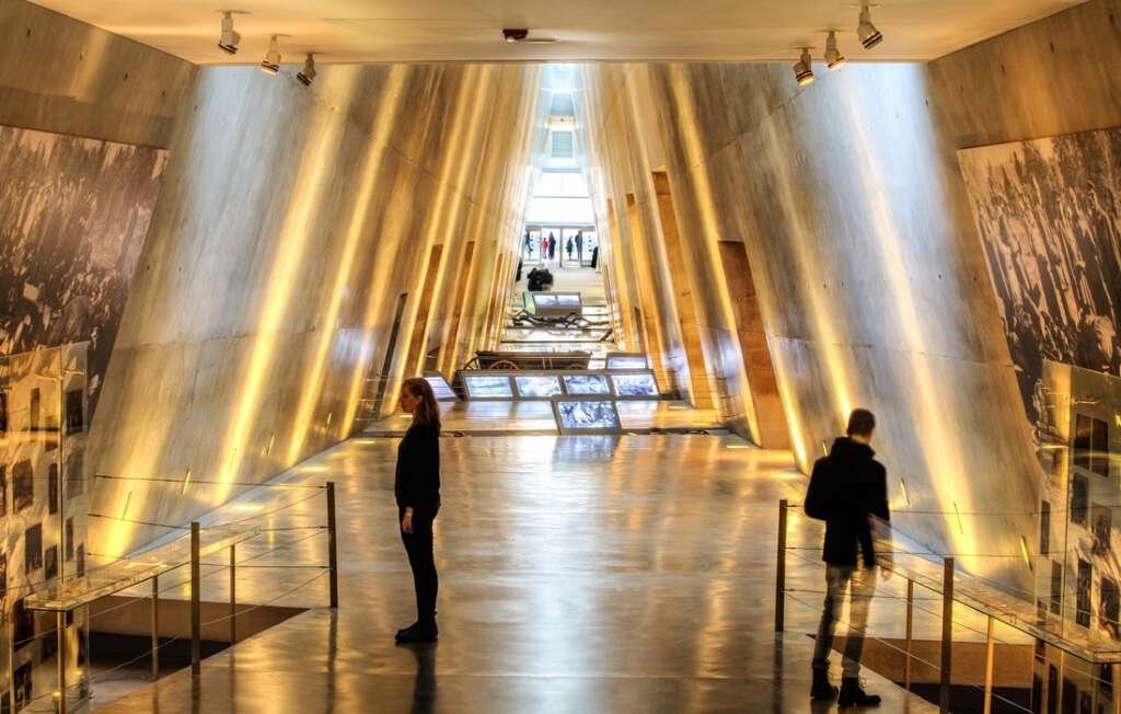The Yad Vashem Holocaust Memorial in Jerusalem, designed by Safdie Architects, blends architecture with memory and reflection.