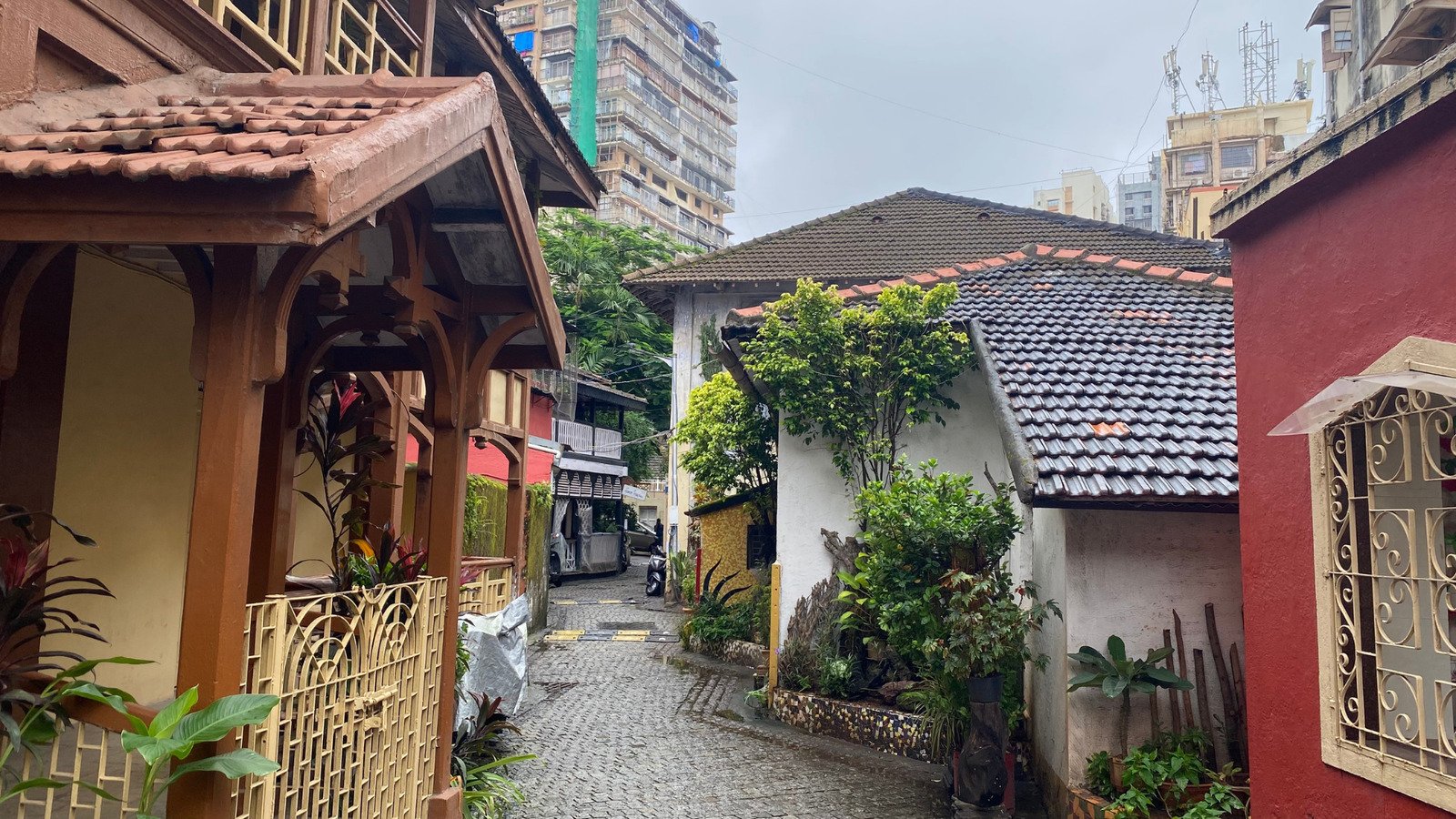 street view of narrow, rain washed cobbled street of Kotachi Wadi neighbourhood
