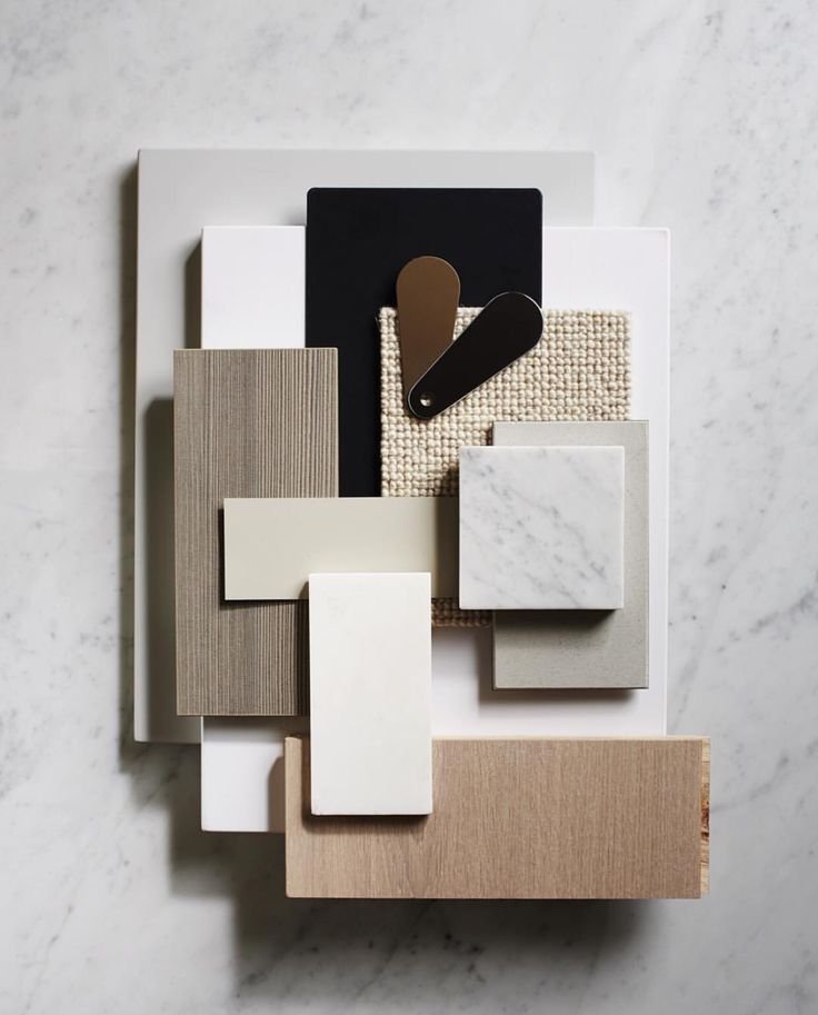 tablescape with grey and white material samples