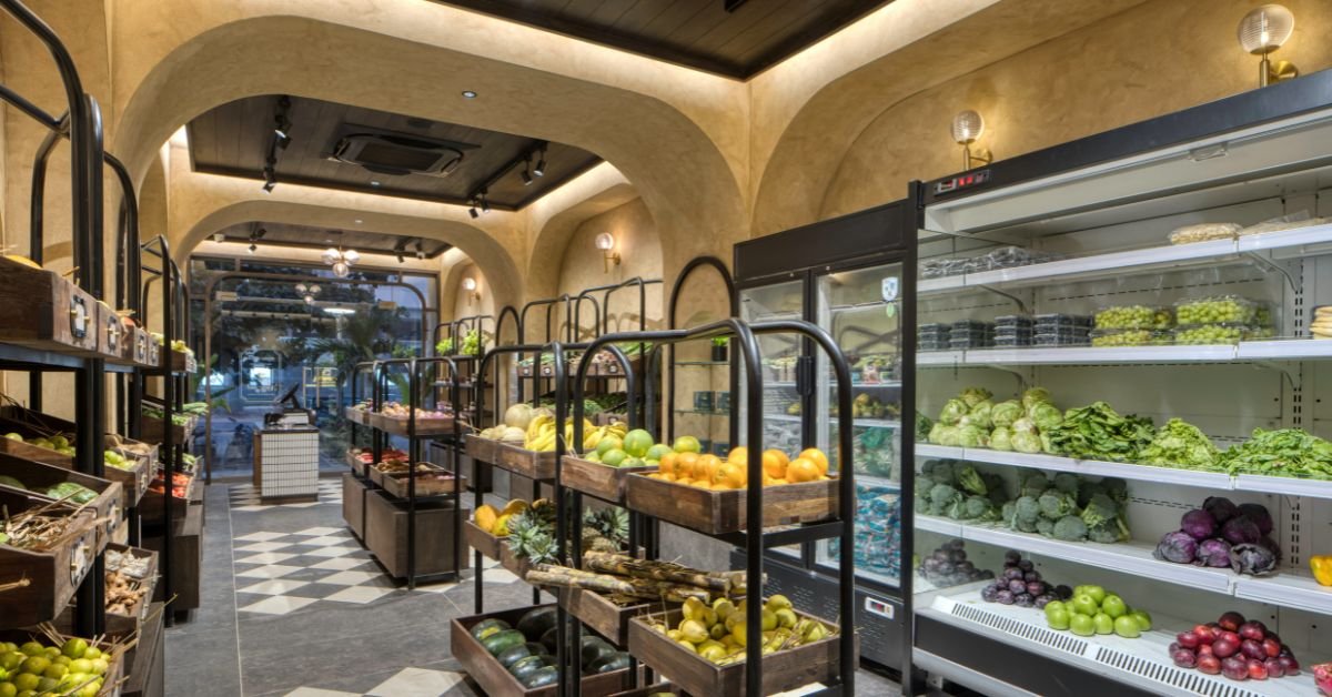 This earthy Ahmedabad store uses cow dung walls and warm wood to bring freshness to retail design