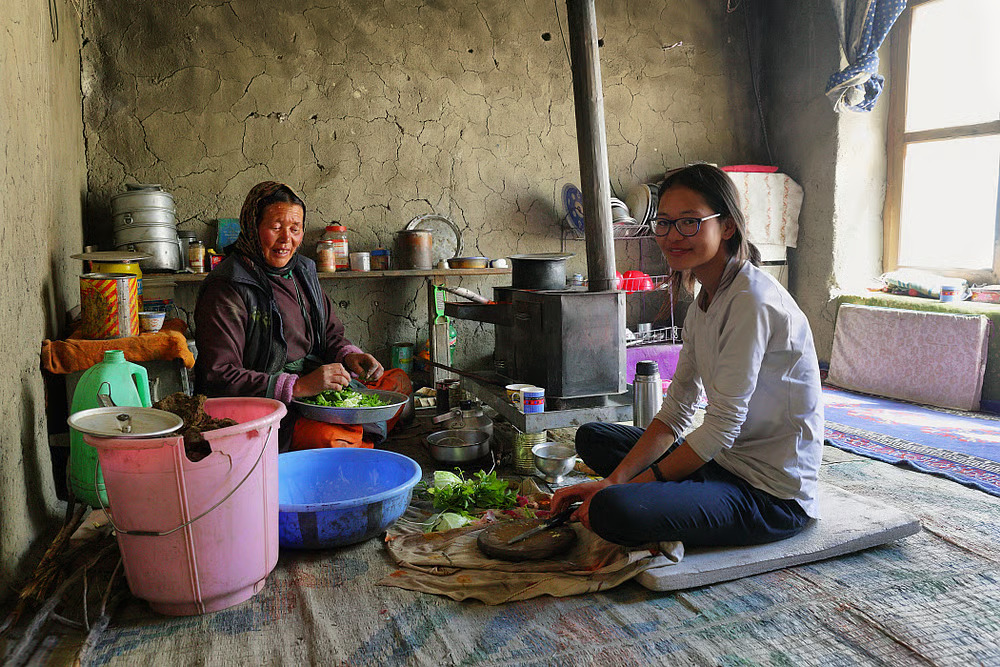Hospitality Design For The Community: How Architects Are Rethinking What It Means To Host 1 community kitchen in a hostel designed for cultural exchange - an example of inclusive hospitality design.