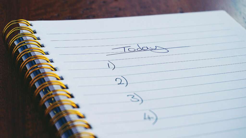 a notebook with a blank to-do list