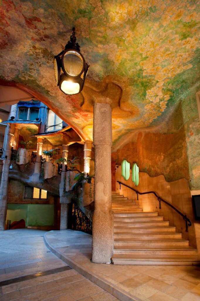 The open, airy interior of one of Casa Milà’s apartments, with intricate design details.

