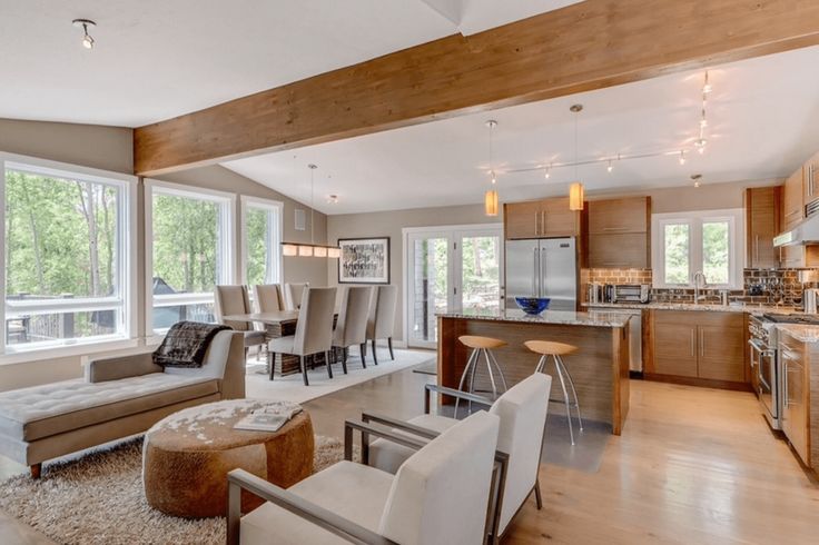 Open floor plans with skylights bringing in abundant natural light in a compact space.