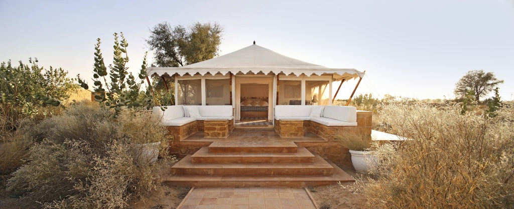 The Serai desert camp in Jaisalmer with vibrant textiles and local craftsmanship, offering a unique cultural staycation experience