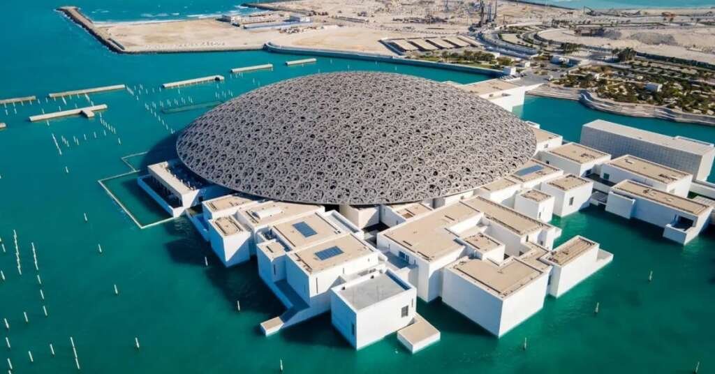Louvre Abu Dhabi Architecture: How Light, Shadow And Culture Come Together 1 louvre abu dhabi's iconic floating dome creating intricate patterns of light and shadow over the museum complex.